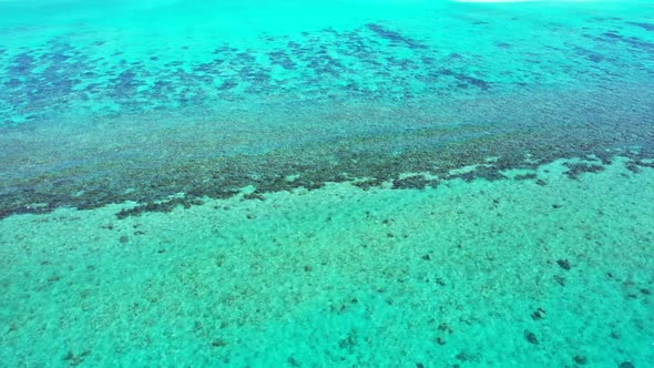 Aerial drone view landscape of marine coastline beach holiday by blue sea with white sandy backgroun