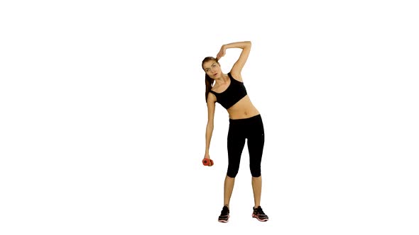 Fitness Woman Working Out with Dumbbell Over White Background, Gym