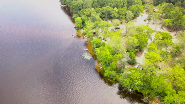 Aerial approach of forest and pond in Burlingame Park at Charlestown, Rhode Island