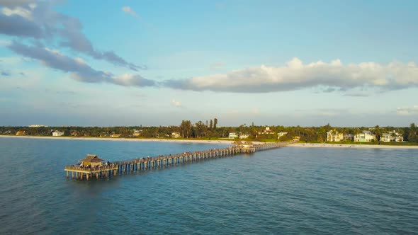 View From the Ocean To the Pier with Tourists