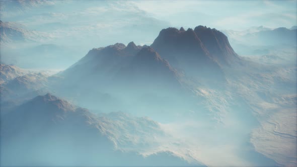 Distant Mountain Range and Thin Layer of Fog on the Valleys