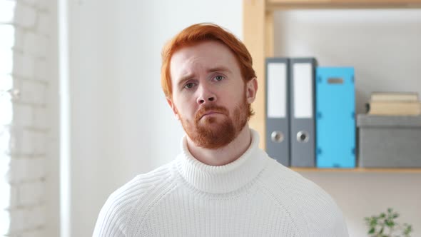 Sad Man with Red Hairs Feeling Upset, Worried