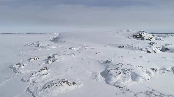 Snow Covered Antarctica Mountain Aerial View