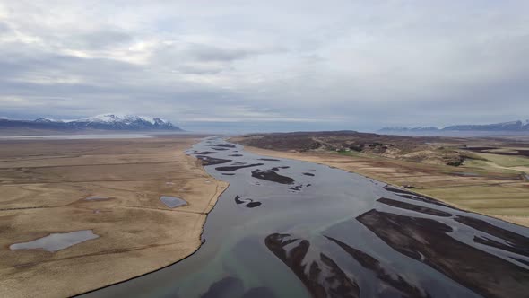 Aerial view of a diverging glacial river system in Iceland in an amazing landscape.