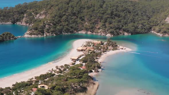 Aerial Flying Oludeniz Beach and Lagoon Beautiful Bay Crystal Blue Water Turkey