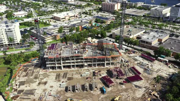 Aerial Flyover Camera Tilt Down Construction Site With Cranes Sls Resort Hallandale Fl Usa