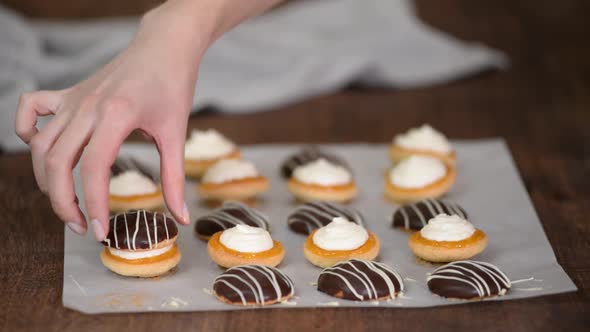 Making Homemade Cookies with Apricot Jam and Whipping Cream