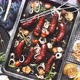 Top View on Delicious Grilled Sausages Served with Onion Tomatoes Garlic Bread and Herbs - VideoHive Item for Sale