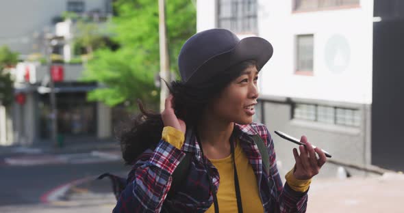 Mixed race woman on the phone