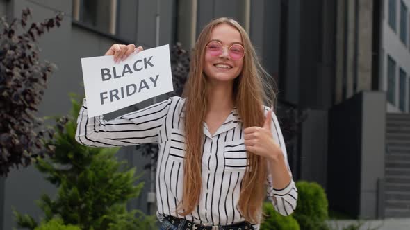 Girl Holding Black Friday Text Inscription, Rejoicing Good Discounts, Low Prices for Online Shopping