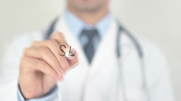 Serious Illness Doctor Writing on Transparent Glass