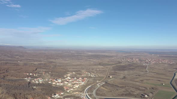 Landscape with Danube river flow in distance 4K drone video