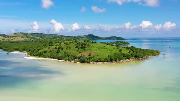 A Tropical Island with a Turquoise Lagoon and a Sandbank. Caramoan Islands, Philippines.