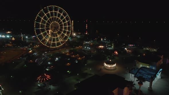 Flying over Amusement Park Tsitsinatela at night. Shekvetili, Georgia 2020