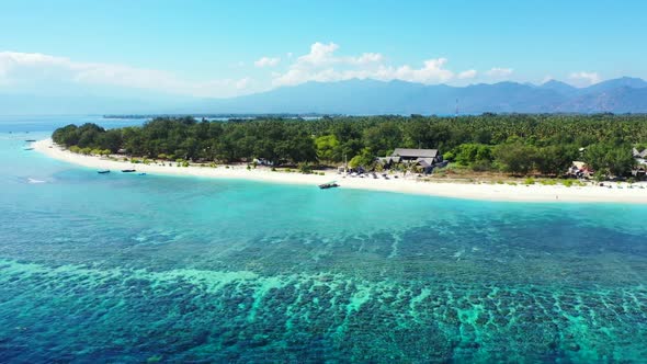 Aerial top view panorama of luxury lagoon beach lifestyle by blue green sea with bright sandy backgr