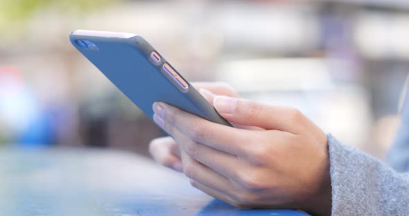 Close up of woman using smart phone