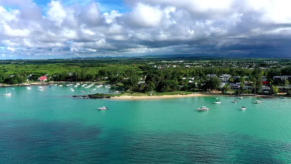 Boats on clear water at bay of Cap Malheureux, Mauritius