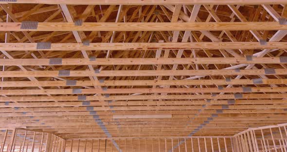 On the Roof Post Beam Framework Trusses for a New Residential Building are Visible