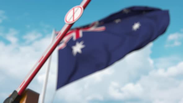 Closed Gate with STOP CORONAVIRUS Sign at Flag of Australia alt