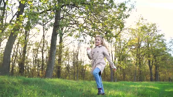 Little Girl Having Fun Near Forest