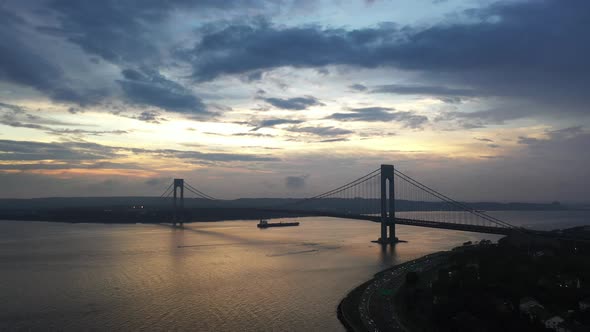 An aerial view over Gravesend Bay in Brooklyn, NY. The drone camera slowly trucks right, while panni