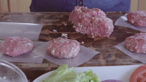 Preparing gourmet burger patties with ground beef