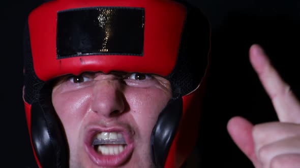 Angry Male Boxer on a Black Background