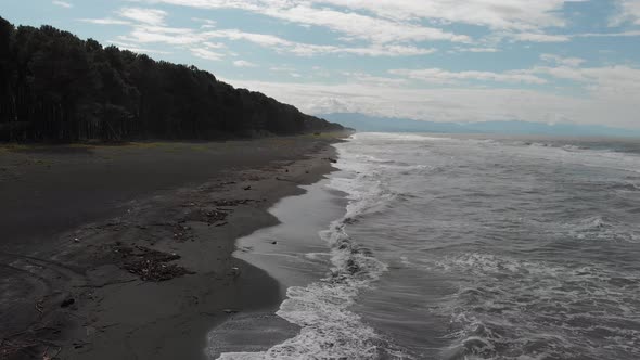 Drone flying over of big waves in Shekvetili sand beach