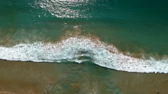 Aerial footage of waves and foam