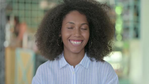 Portrait of Smiling African Businesswoman Looking at Camera