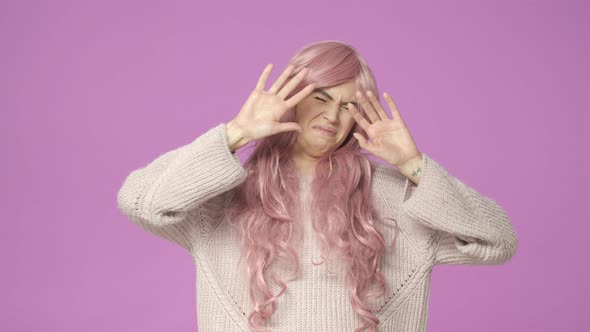 Slowmotion Displeased Cute European Woman in Adorable Pink Wig Squinting Blink and Grimacing Cover