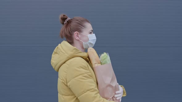 Young Woman with Purchases From the Supermarket