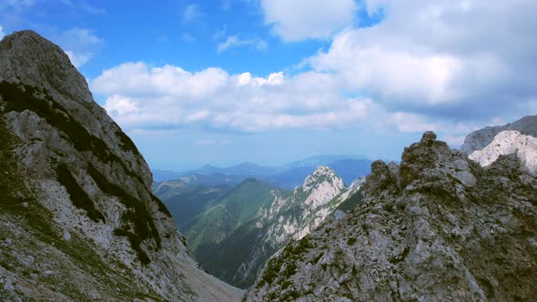 This aerial video shows the Kamnik-Savinja Alps in Slovenia. Captured on one of the highest peaks na