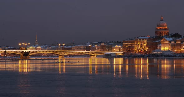 The Panoramic Footage of the Winter Night City SaintPetersburg with Picturesque Reflection n Water