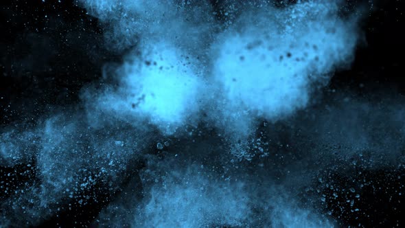 Super Slowmotion Shot of Blue Powder Explosion Isolated on Black Background at 1000Fps