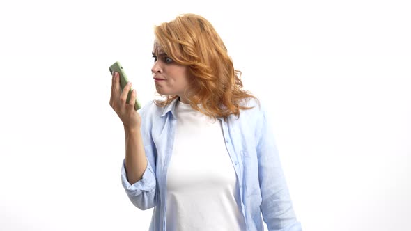 Angry Woman Express Anger to Caller Holding Smartphone Feelings