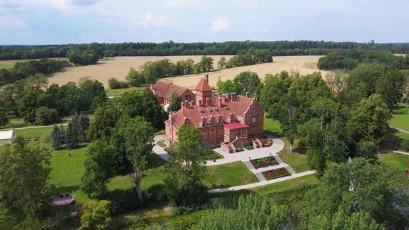 Jaunmoku Brick Medieval Castle Near Tukums, Latvia  Aerial Dron 4k Shot Jaunmokas Manor Park.