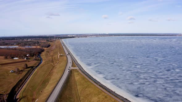 Aerial Winter View of the Huge Dam in Latvia Near City of Salaspils and Riga