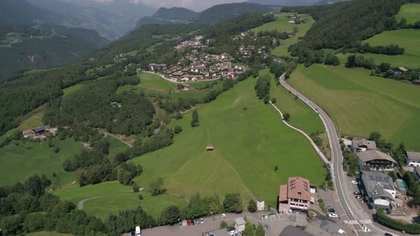 Aerial drone video of the city of Völs am Schlern Fie allo Sciliar  on the Italian Alps Dolomites