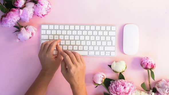 Hands Typing on Keyboard