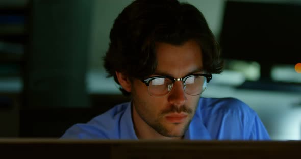 Businessman working on computer in office 4k