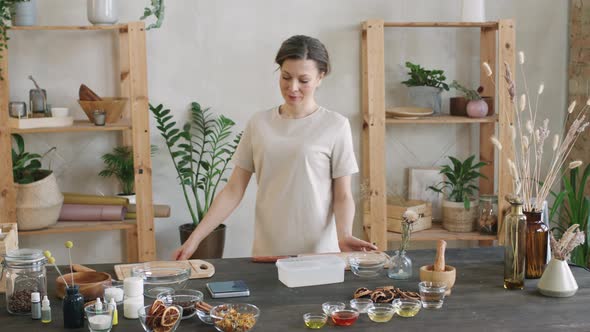 Smiling Woman With Natural Cosmetics Ingredients