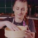 Woman Sifts Flour Through Sieve in the Kitchen While Baking Croissants - VideoHive Item for Sale