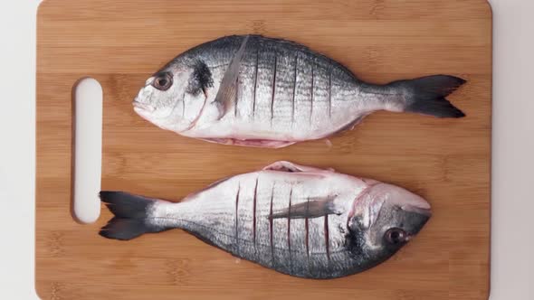 Top view of process of cooking fish