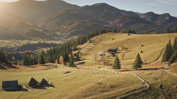 Aerial Sunset Countryside Farm at Mountain Village Slow Motion Panorama