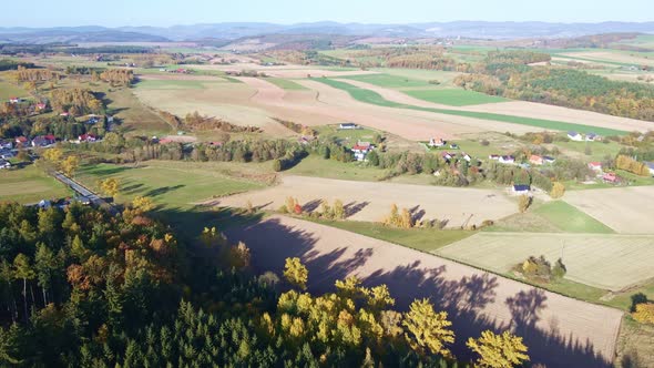 Landscape with Mountains Green Fields and Countryside Village Aerial View