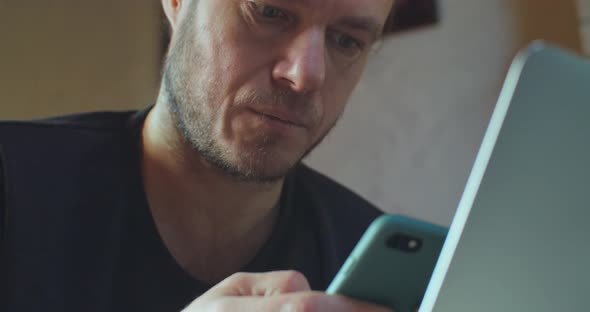 Low Angle View of Serious Businessman Using Notebook Pc Searching Internet Slow Motion