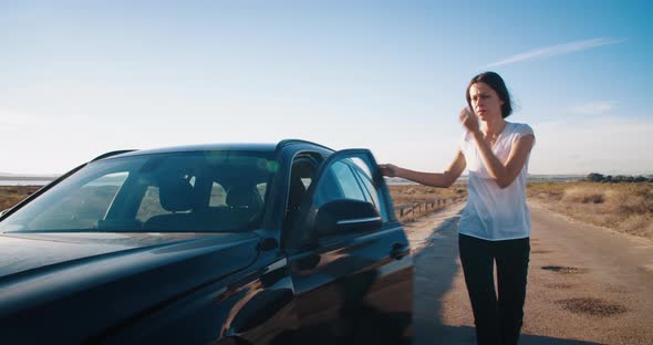 Vehicle Breakdown on Travel Young Woman Driver Outs of the Car Opening Hood