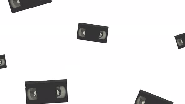 Retro Video Cassette Tape Falling Down on White Background