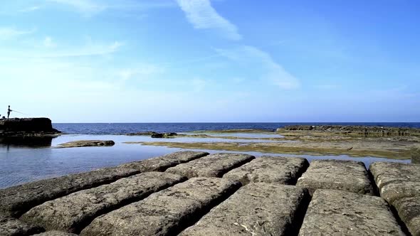 landscape on the stones by the sea